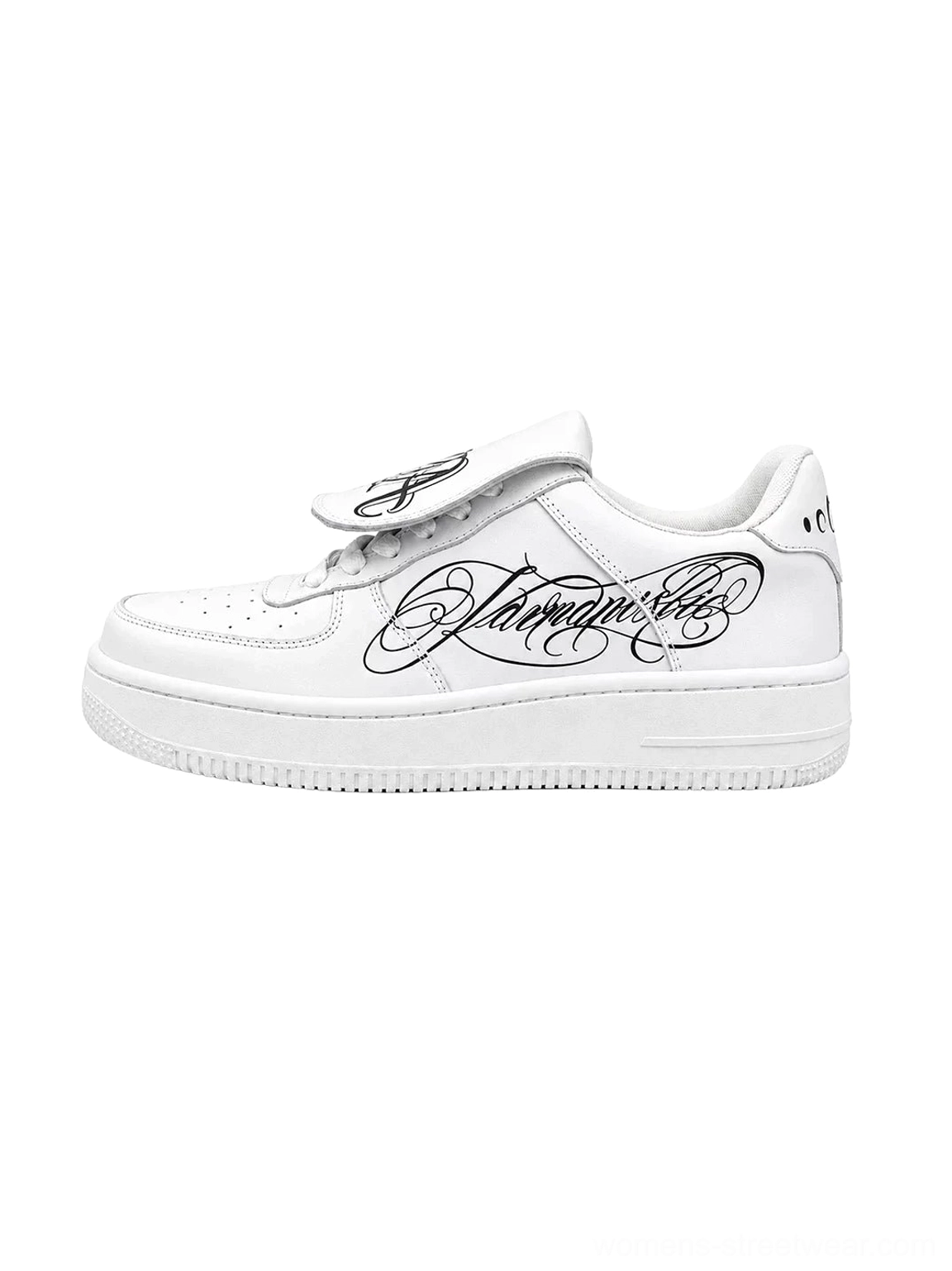 White foldover tongue low top leather sneakers with gothic printed tongue, cursive tattoo side graphic and metallic studded midsole