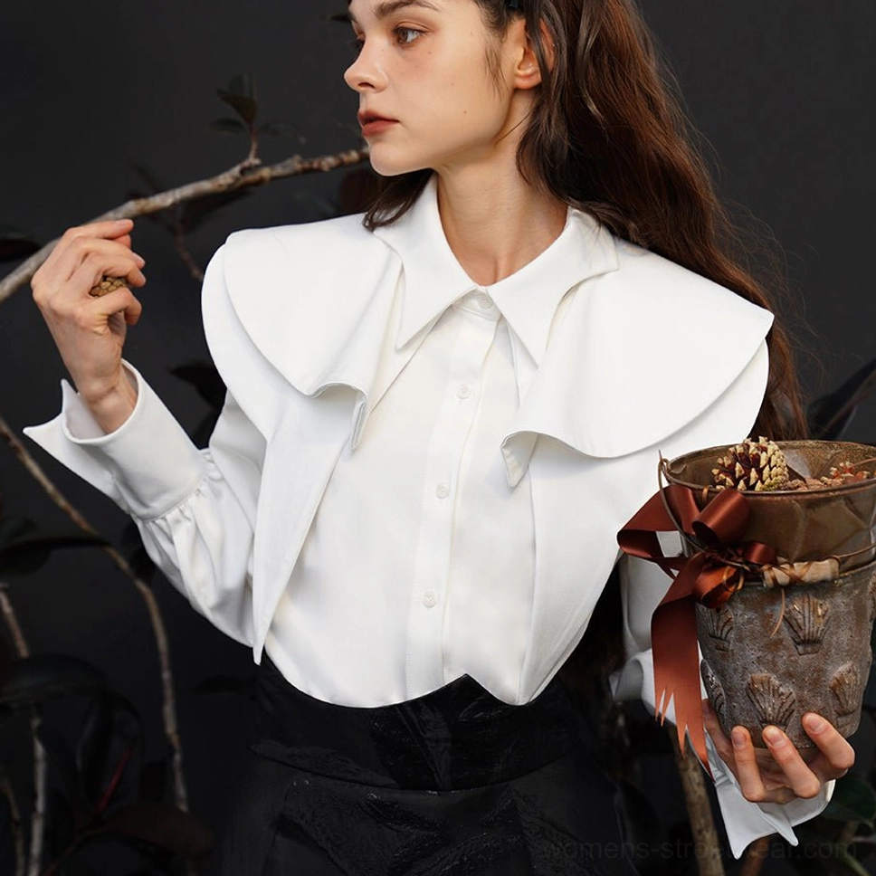 White layered ruffle collar blouse with long lantern sleeves styled in an elegant Korean streetwear outfit