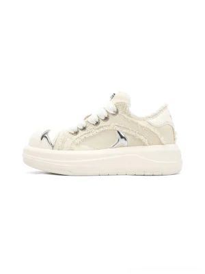 White frayed canvas chunky platform skate sneakers with wide laces, metallic side accent, and thick rubber sole side view