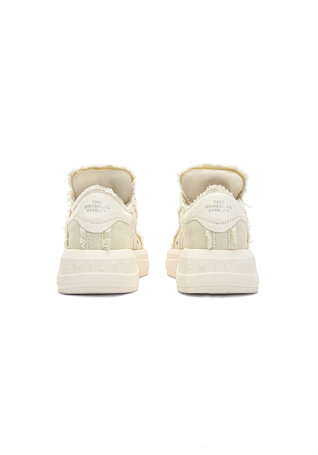 White frayed canvas chunky platform skate sneakers with wide laces and elevated rubber sole streetwear detail view