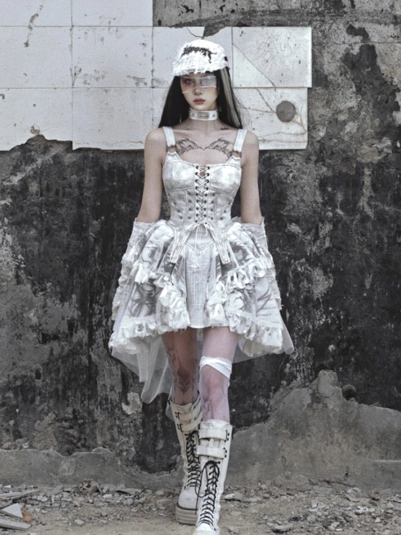 Full-body white gothic high-low tulle train dress with lace-up corset bodice and asymmetric layered hem