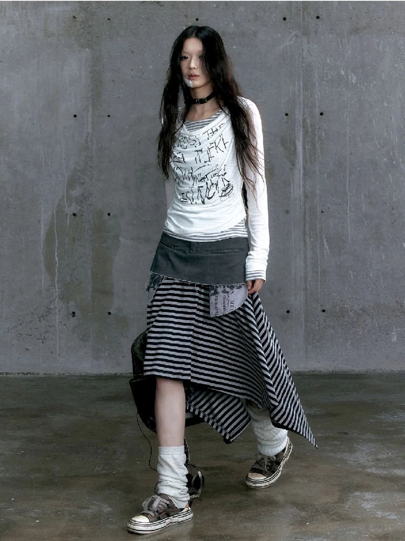 White graffiti graphic long sleeve top with striped layered neckline and fitted sleeves