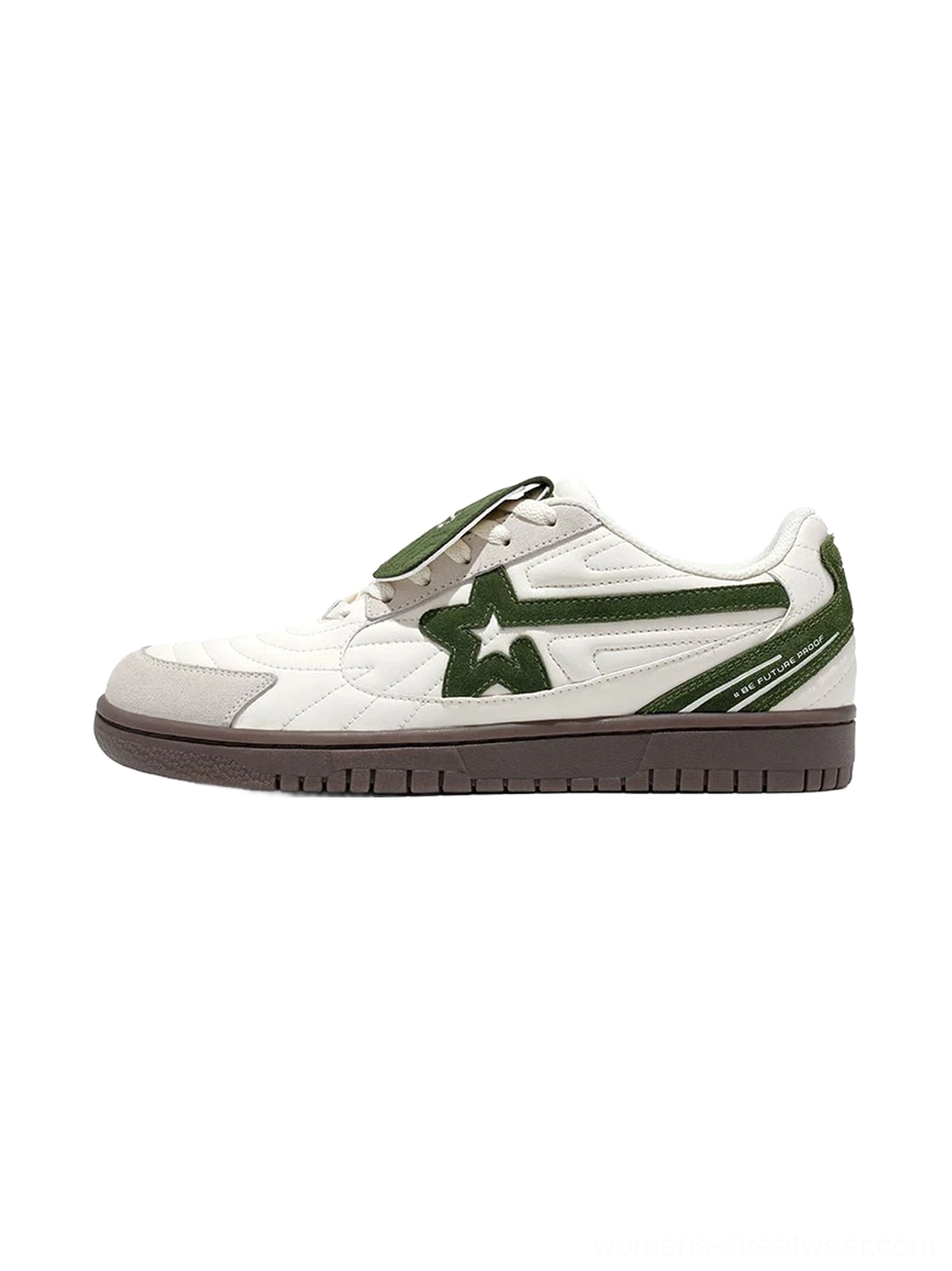 White and green detachable tongue star low top streetwear sneakers shown from a three quarter side view with quilted toe panels layered suede accents and dark brown rubber outsole
