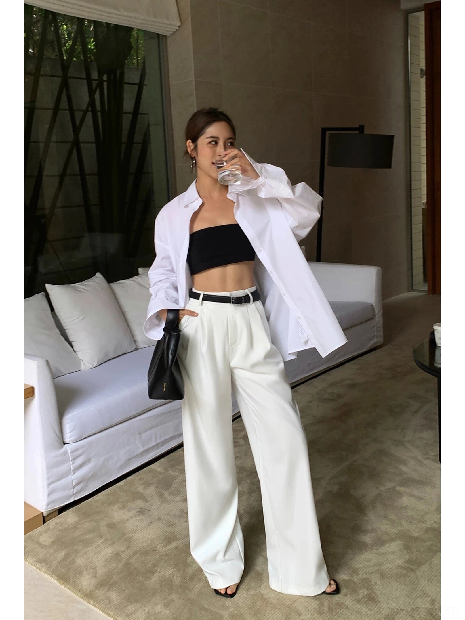 White high-waist wide-leg tailored streetwear trousers with smooth drape fabric and clean front pleats