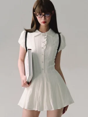 White Korean streetwear mini shirt dress with structured pleats classic Peter Pan collar tailored waist and front button closure