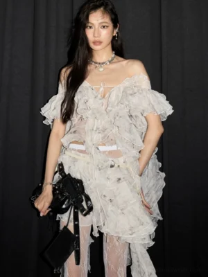 White lace ruffle mini skirt styled with a sheer floral off-shoulder top and modern Korean streetwear accessories