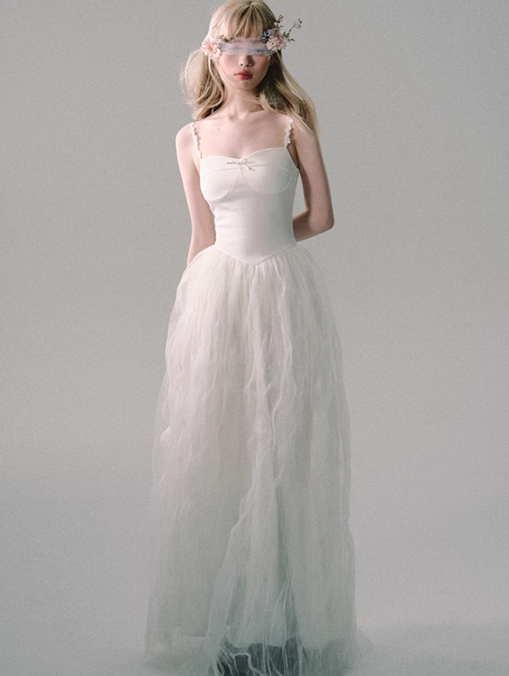 White lace strap tulle sweetheart gown presented in an editorial product view for modern bridal and formal fashion styling