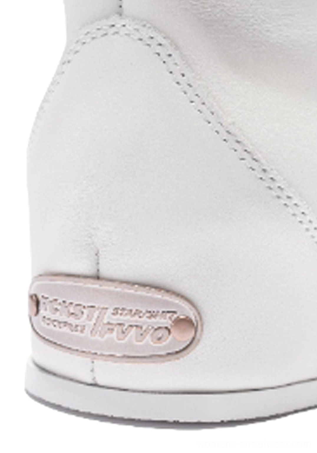 Close-up rear heel view of white leather high-top boot with metallic heel plate and clean stitched leather finish