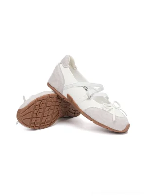 White and grey Mary Jane ballet sneakers overhead stacked view showing crossed bow straps and durable brown gum rubber outsole