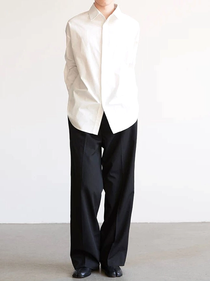 White minimal poplin shirt styled with black wide-leg trousers and leather shoes in Seoul streetwear outfit
