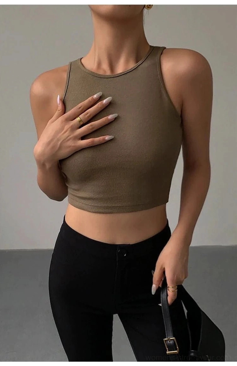 White minimalist cropped tank top Scandinavian aesthetic - pure sleeveless design perfect for clean monochrome outfits and high-contrast fashion compositions