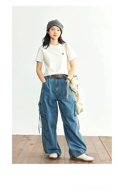 White minimalist embroidered logo crew neck t-shirt full body front view cargo jeans crossbody bag