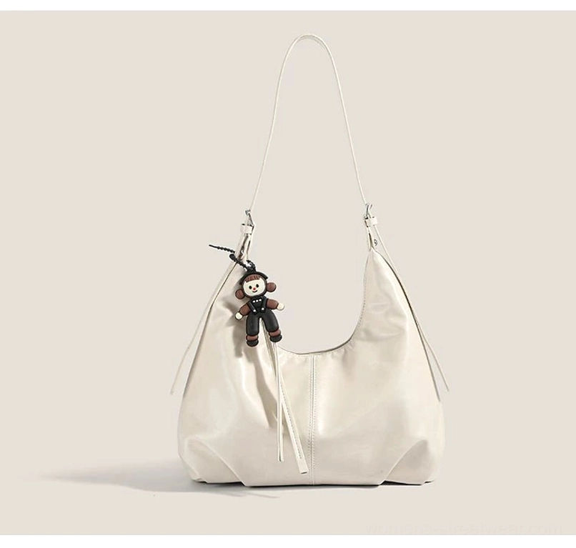 White with pendant monkey charm crescent hobo shoulder bag for Y2K Korean streetwear and casual everyday styling