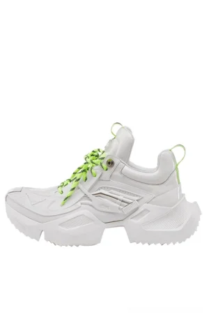 White and neon green futuristic platform sneaker shown from the right side with a geometric 3D-printed-style upper, lace-up closure, and sculpted chunky jagged sole