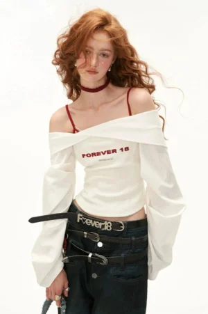 White off-shoulder bell sleeve crop top with red FOREVER 18 graphic lettering and fitted Y2K Seoul streetwear silhouette