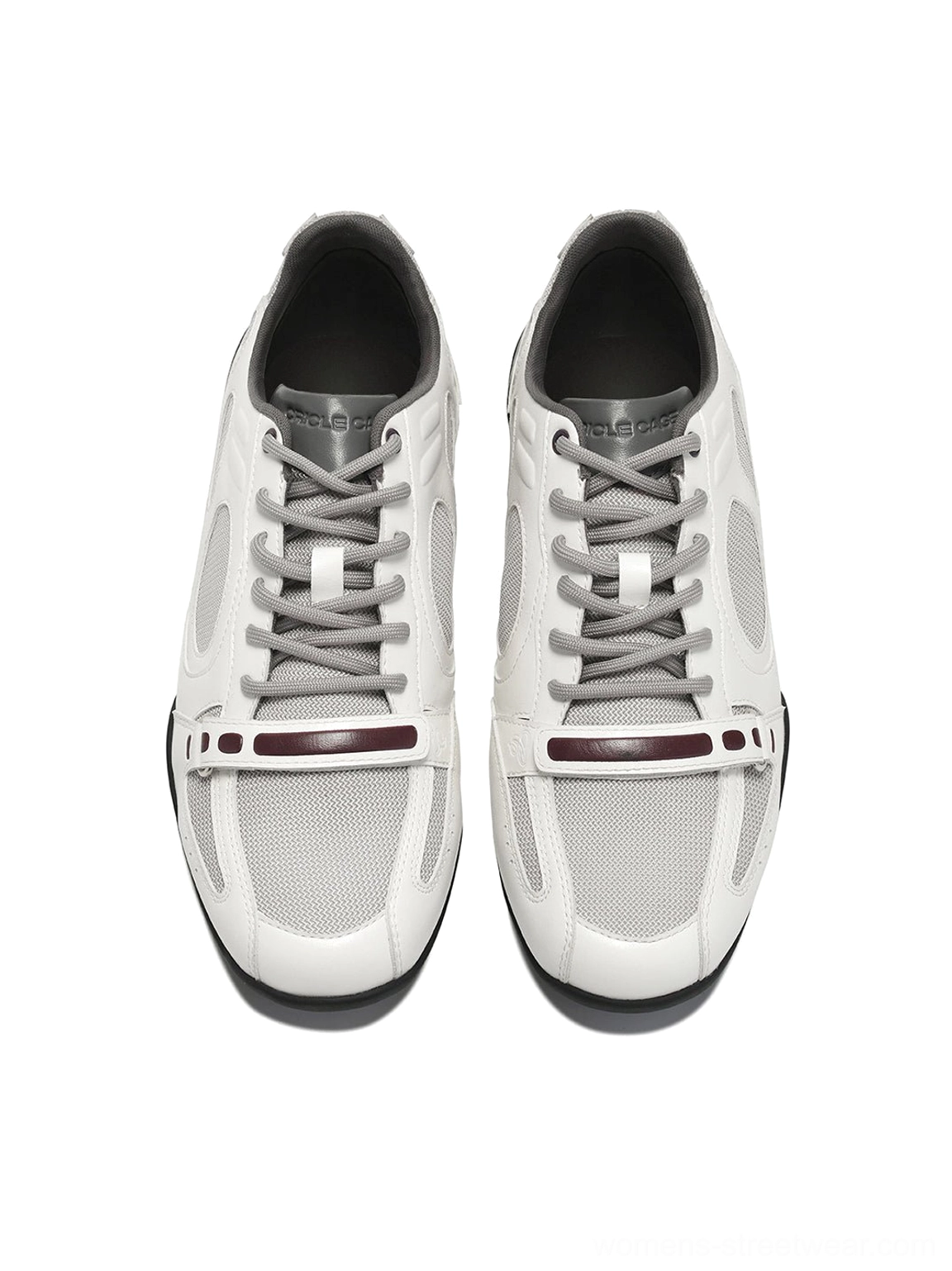 Front view of matching white perforated retro sport sneakers with grey panels burgundy trim and grey laces