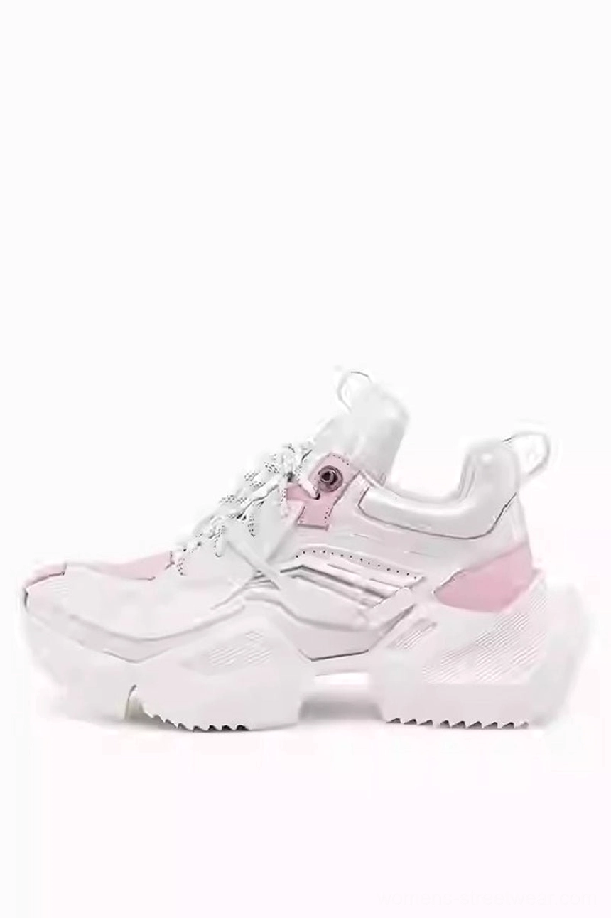 White and pink futuristic 3D-printed-style platform sneaker shown from the right side with pink tongue and heel accents, classic lacing, geometric upper, and chunky jagged outsole