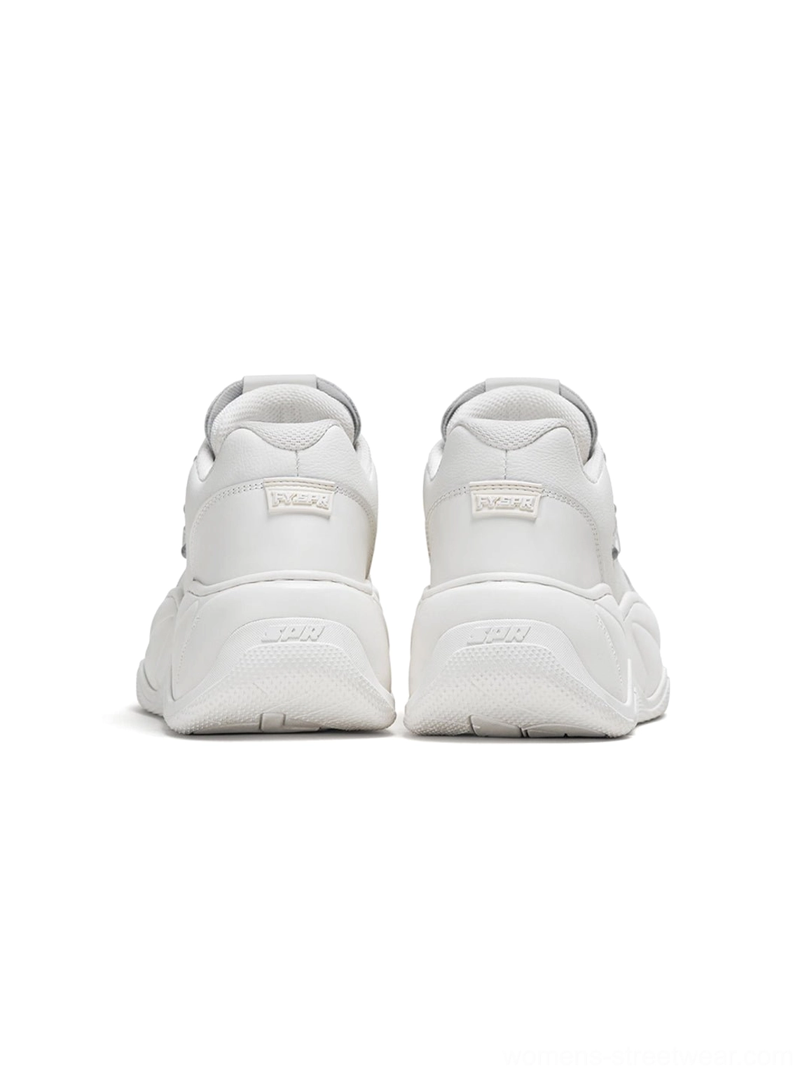 Rear view of matching white platform sneakers showing embossed heel details and a substantial chunky rubber sole