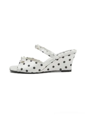 White polka dot bow platform wedge slide sandal shown from above with open square toe and covered wedge heel