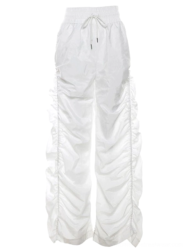 White ruched high-waist wide-leg streetwear cargo pants with dramatic floor-length silhouette and modern utility styling