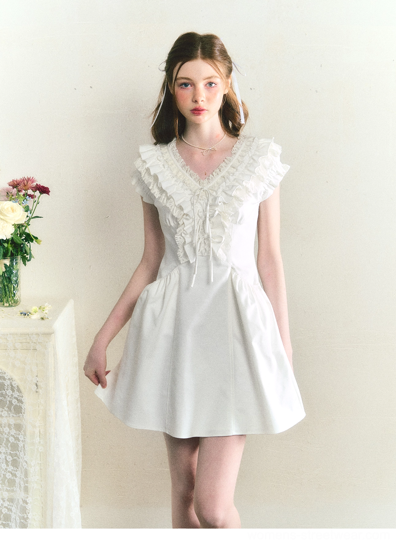 White ruffle cotton Victorian mini dress front view showing the short A-line silhouette