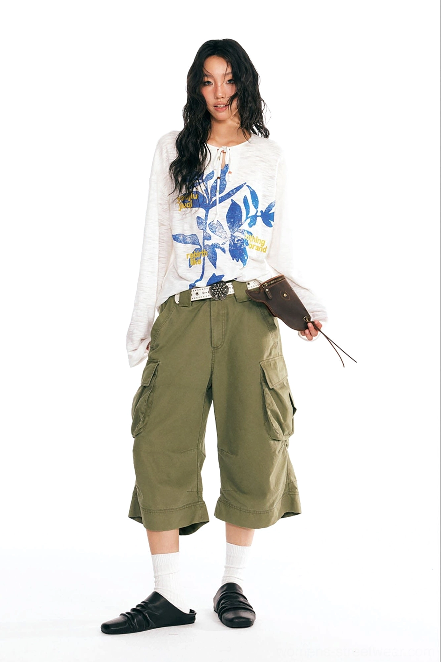 White botanical graphic drawstring long-sleeve tee shown in a full-body side outfit with olive cropped cargo pants