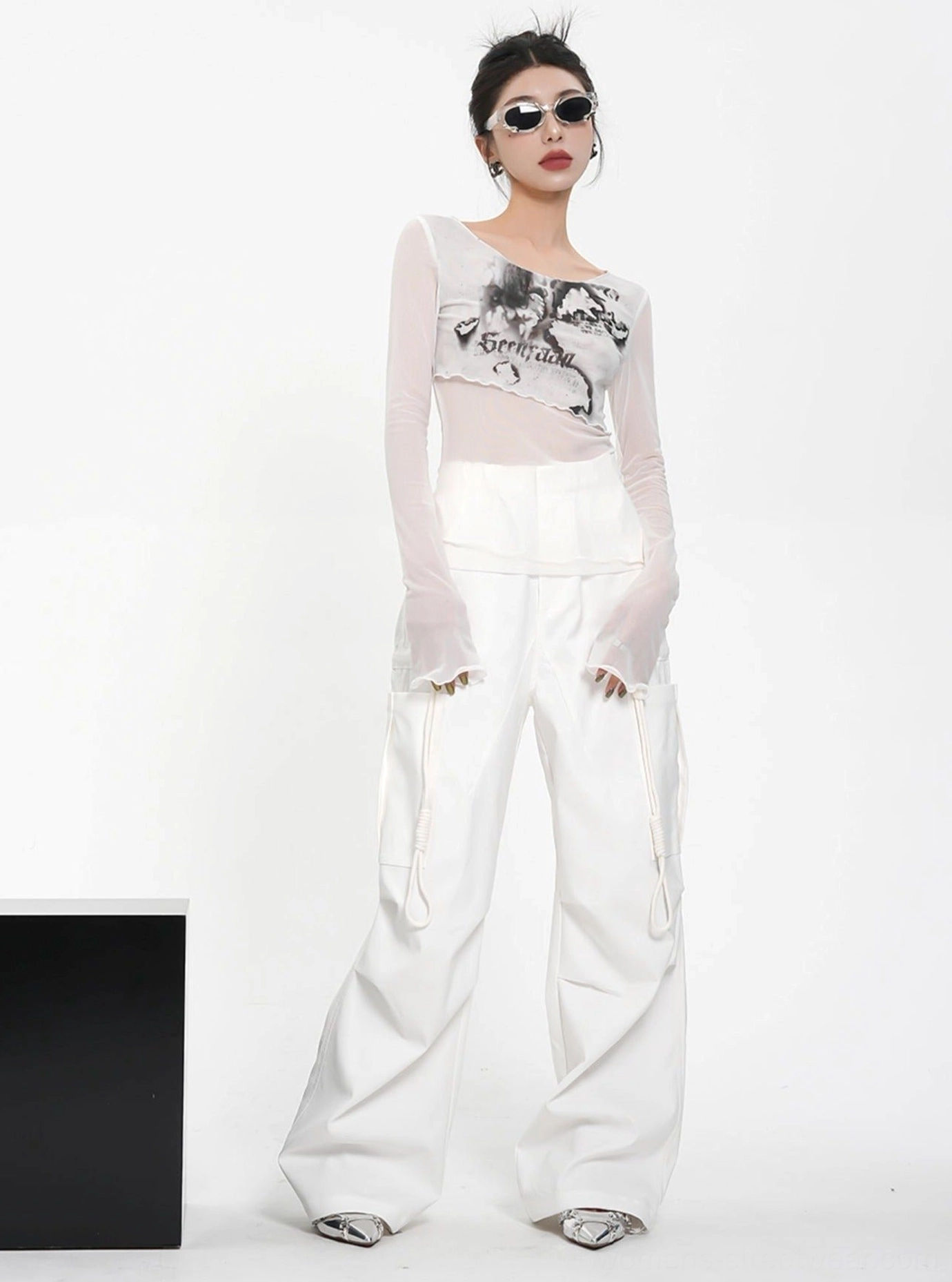 White sheer mesh floral graphic cropped long sleeve top with chest lettering and ink-wash print