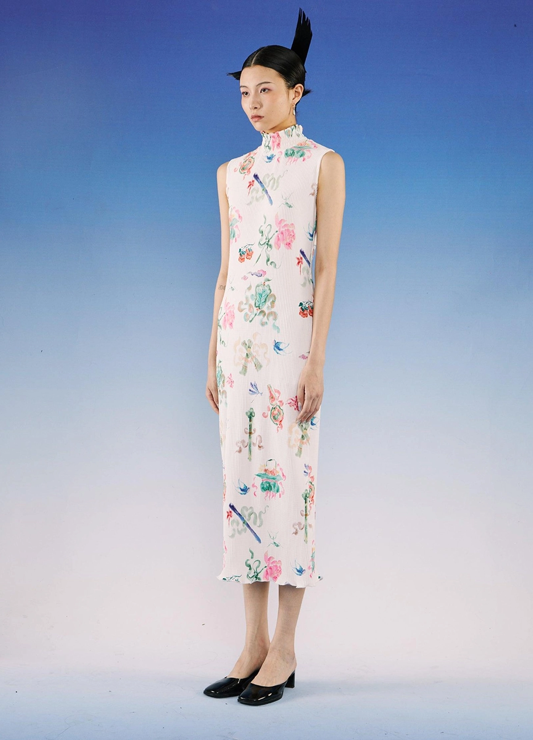 Front full-body view of white sleeveless qipao midi dress with stand collar, ribbed texture, and all-over watercolor floral graphics