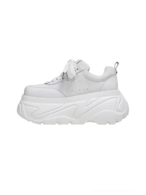 White square-toe platform leather sneakers shown from a low side-front angle with a smooth upper, chunky wavy outsole, and rear pull tab