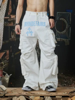 White stacked pocket wide-leg streetwear cargo pants front full-body view with contrast hip graphic and oversized utility silhouette
