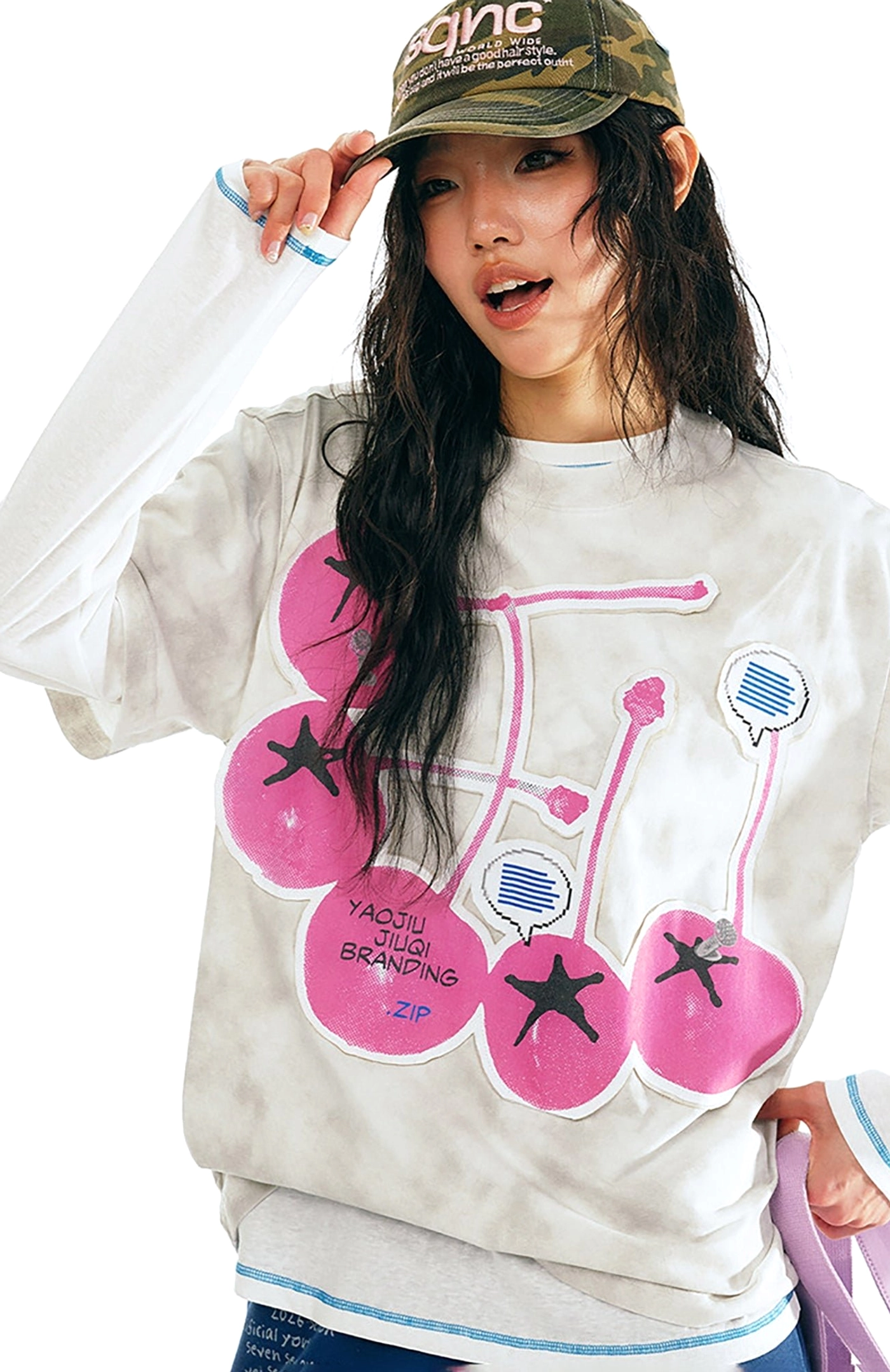Close-up of white tie-dye cherry pop graphic cotton t-shirt with pink cherry artwork speech bubble detail and star accents