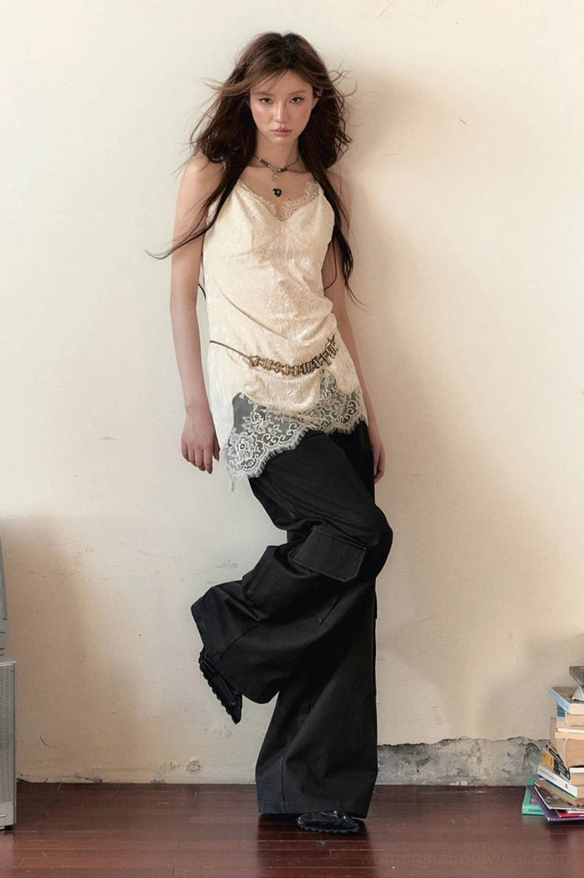 White velvet lace camisole with slim silhouette styled with black cargo pants for a Y2K Acubi streetwear outfit
