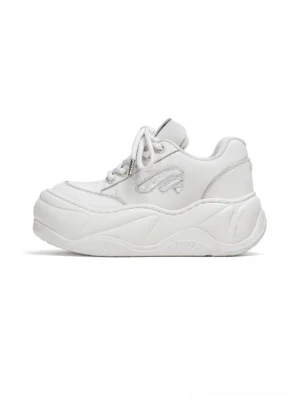 White wave leather platform sneaker shown from the left side with a chunky sculpted outsole and clean streetwear silhouette