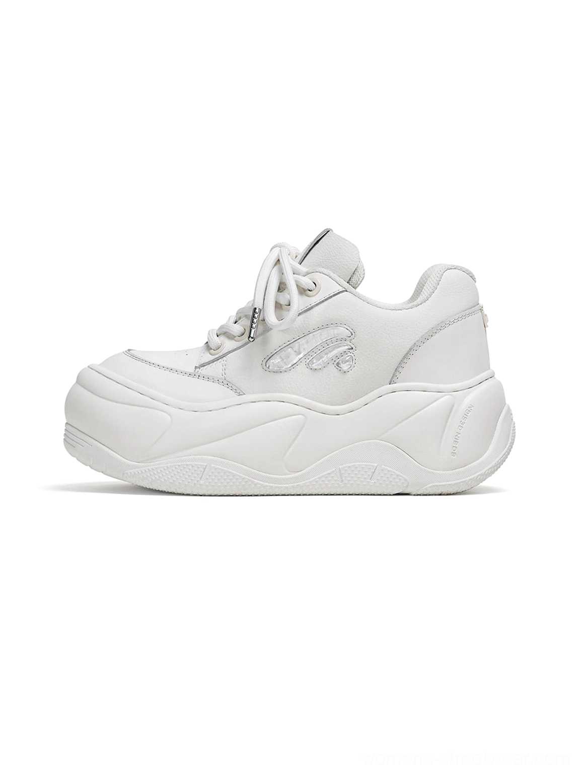 White wave leather platform sneaker shown from the left side with a chunky sculpted outsole and clean streetwear silhouette