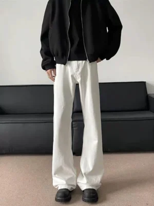 Front full-body view of clean white wide-leg flared denim jeans with a long stacked streetwear silhouette