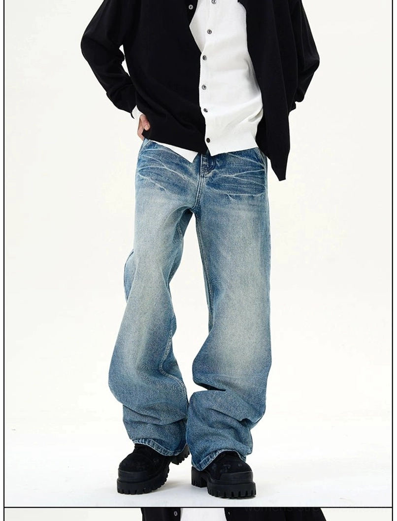 Rear partial view of wide-leg blue vintage jeans showing back pockets, faded creases, and classic waist fit