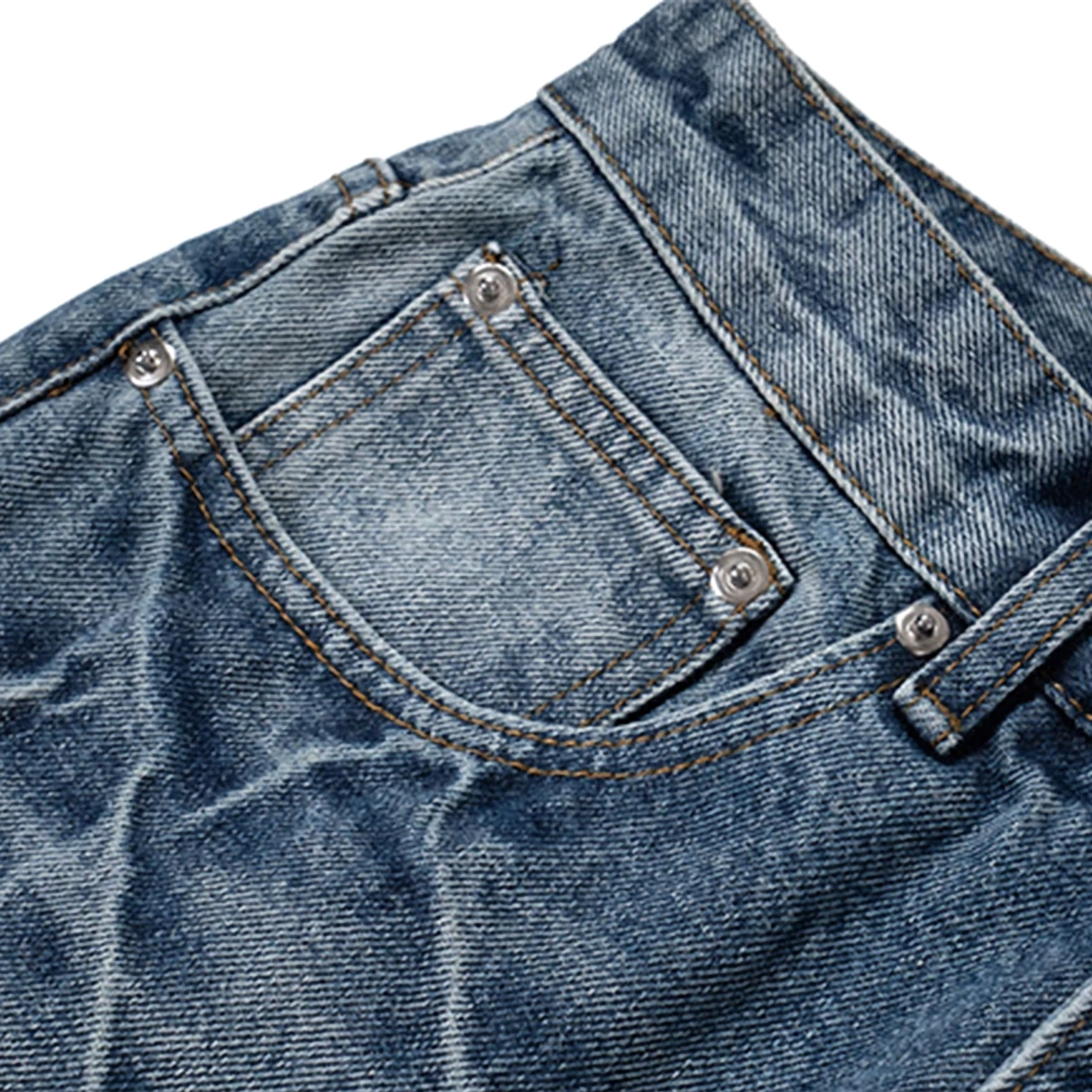 Close-up of vintage washed wide-leg jeans front waist and coin pocket with silver rivets, belt loops, tan contrast stitching, and textured denim