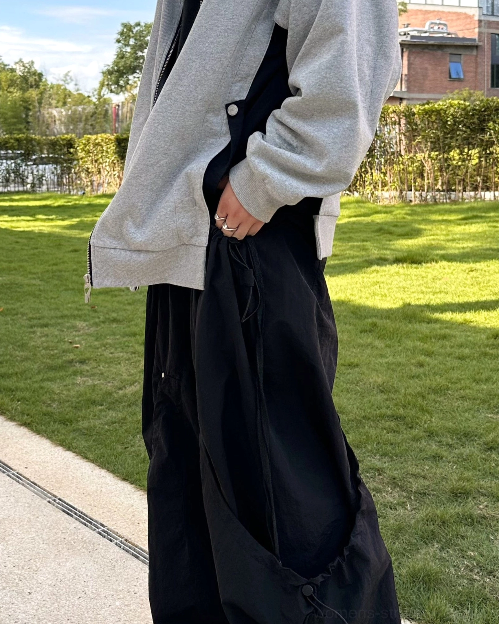 Wide leg streetwear pants styled for an urban casual look with relaxed proportions and utility inspired details