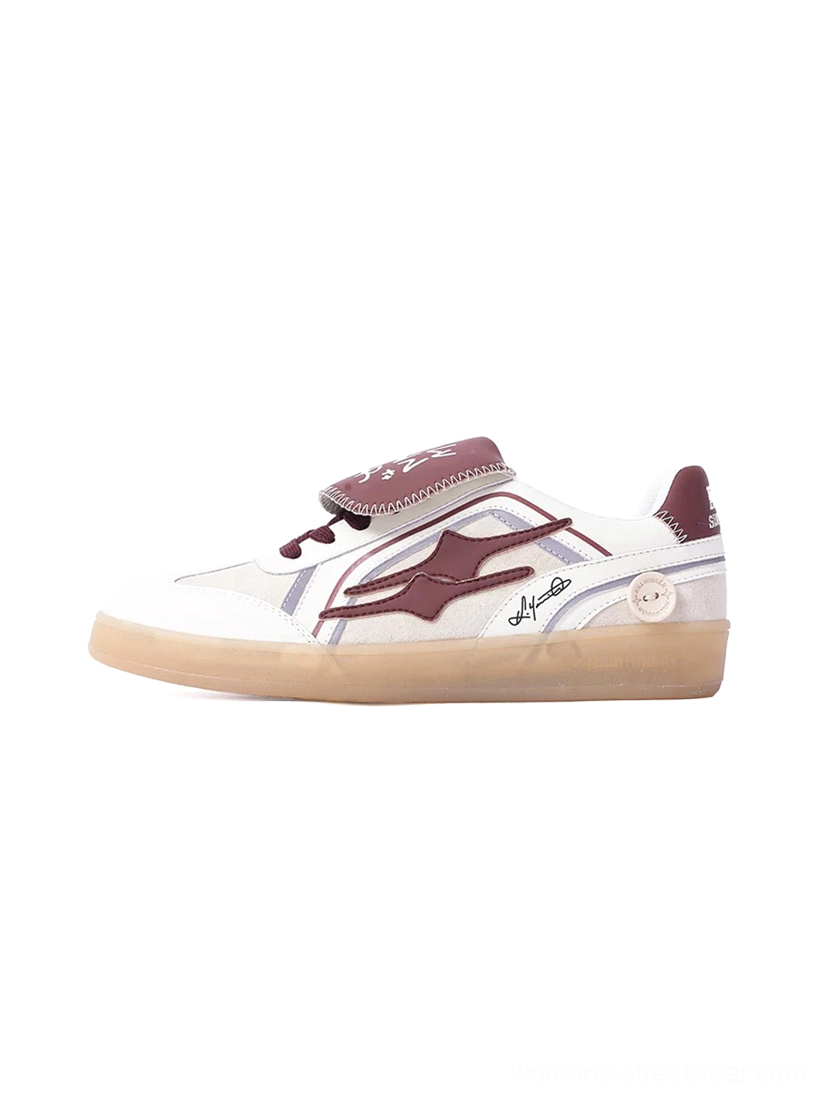 Wine red strap retro trainer sneakers shown in a left side studio view with white upper, wine red overlays, tongue strap, and gum rubber sole