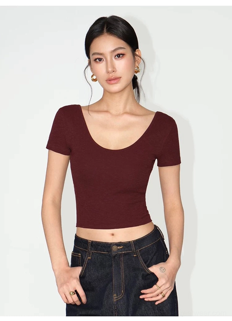 Wine red women's square neck cropped ribbed tee styled with high waisted dark wash jeans for modern streetwear