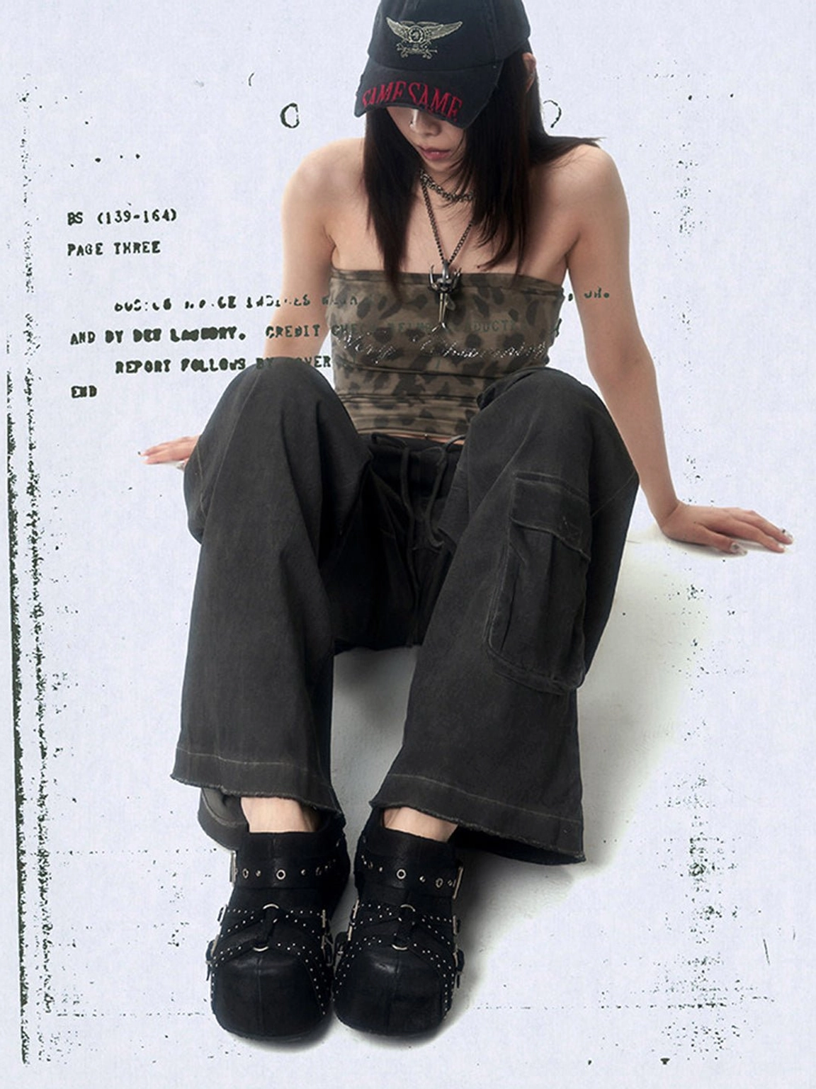 Woman wearing black multi-buckle studded platform mules with cargo pants in a Y2K streetwear outfit