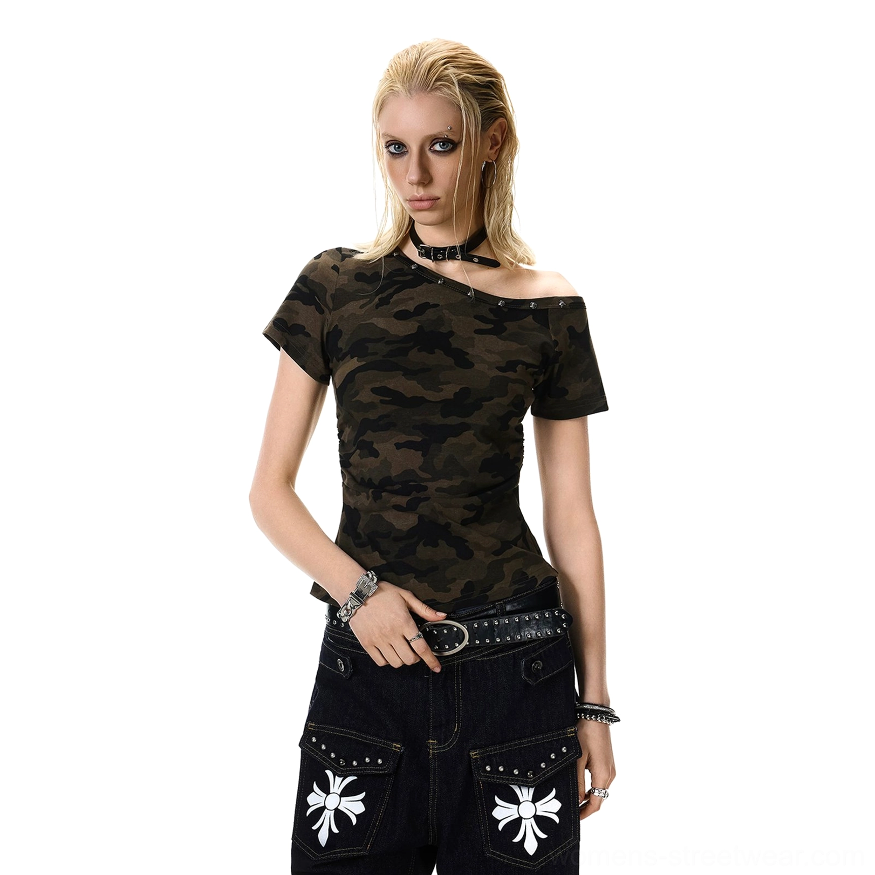 Women's asymmetrical one-shoulder camouflage top with a slim fitted silhouette styled with black graphic cargo pants and a studded belt