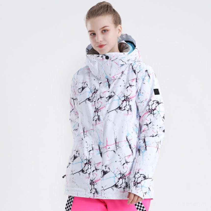 Women’s aurora nebula ski shell jacket in white black and pink marble splatter print shown from the front with hood and snap collar