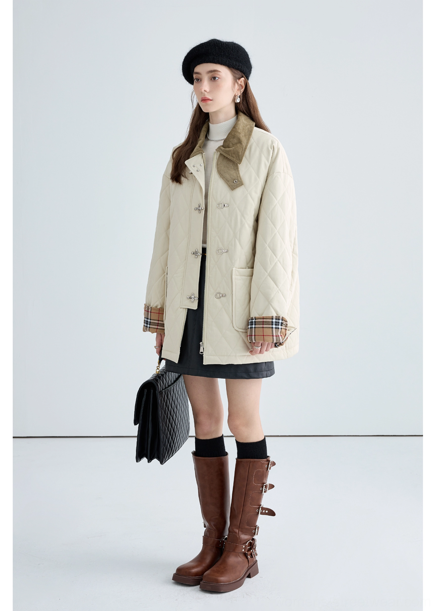 Women's beige quilted cotton jacket front design with contrast corduroy collar, patch pockets and metal buckle closures