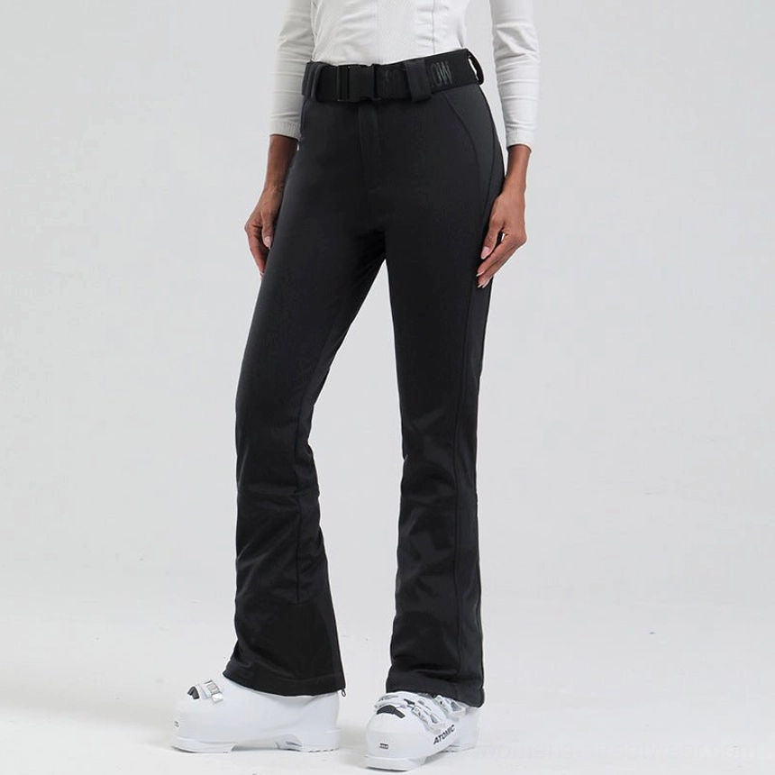 Women's black belted flared ski pants with waterproof stretch snow fabric and contrast cuff panels front view