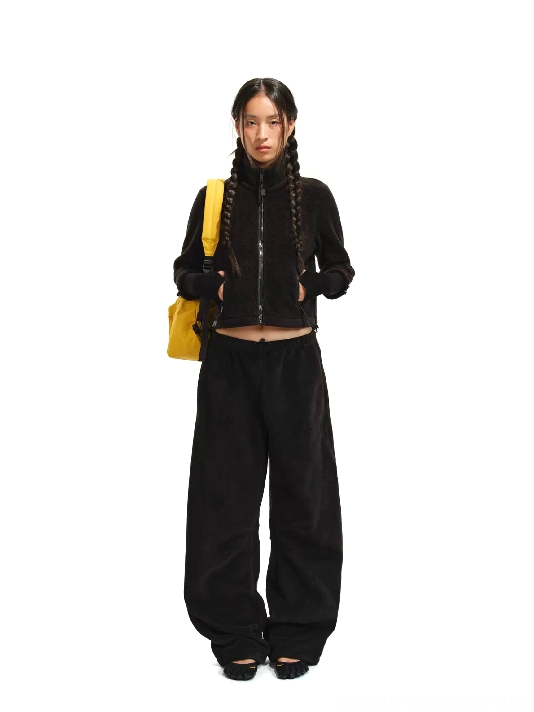 Black cropped fleece zip jacket and relaxed curved-leg fleece pants in Korean streetwear outfit