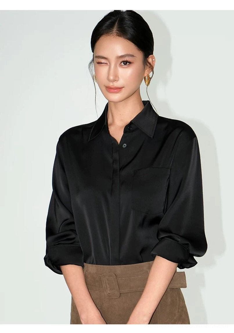 Black women's satin draped pocket shirt with classic collar styled with a tan suede midi skirt