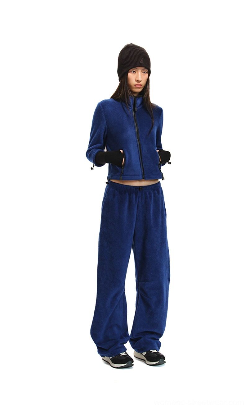 Royal blue cropped fleece zip jacket with extended cuffs and matching relaxed curved-leg pants
