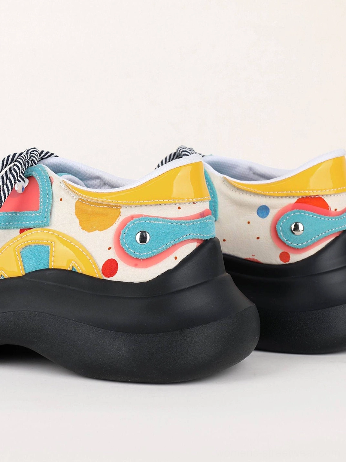 Women’s blue graffiti graphic platform derby shoes with striped laces and rounded toe product view