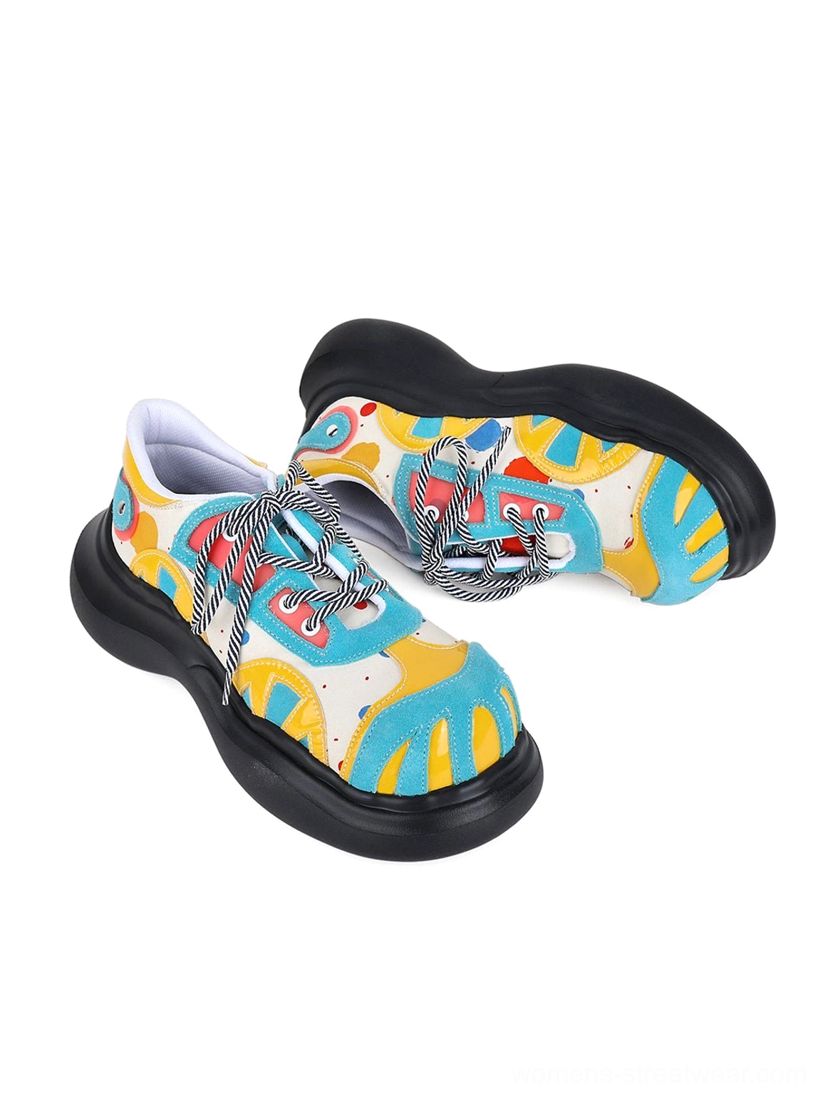 Women’s blue graphic derby platform shoes with colorful primary-color artwork and black chunky outsole